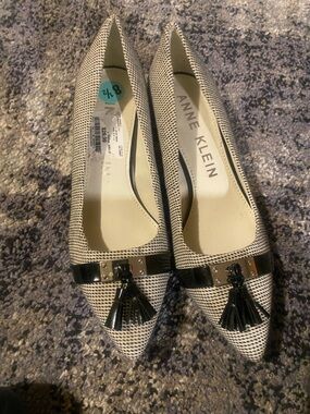 Anne Klein Black and White Pointed Toe Tassel Flats